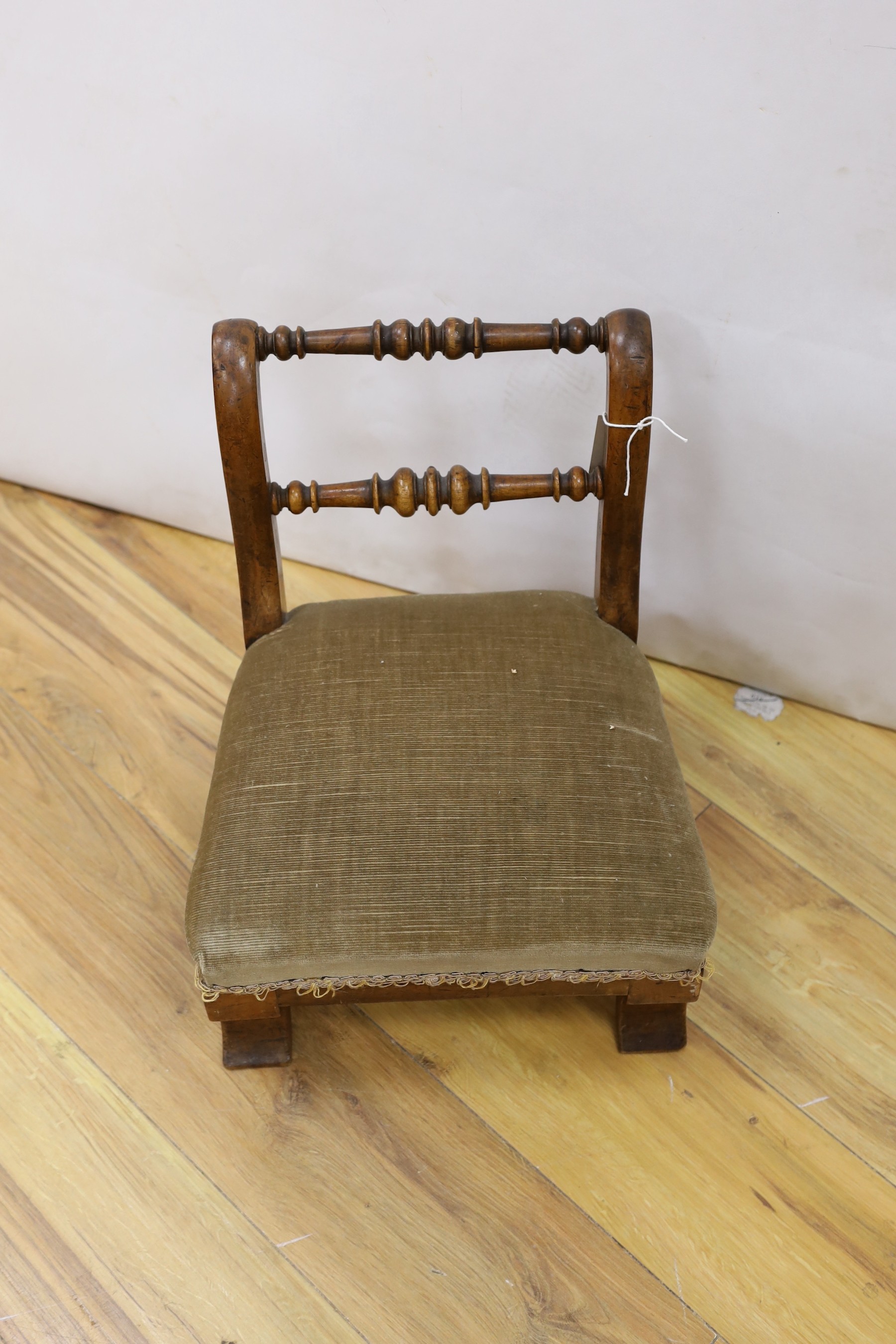 A 19th century mahogany child's chair